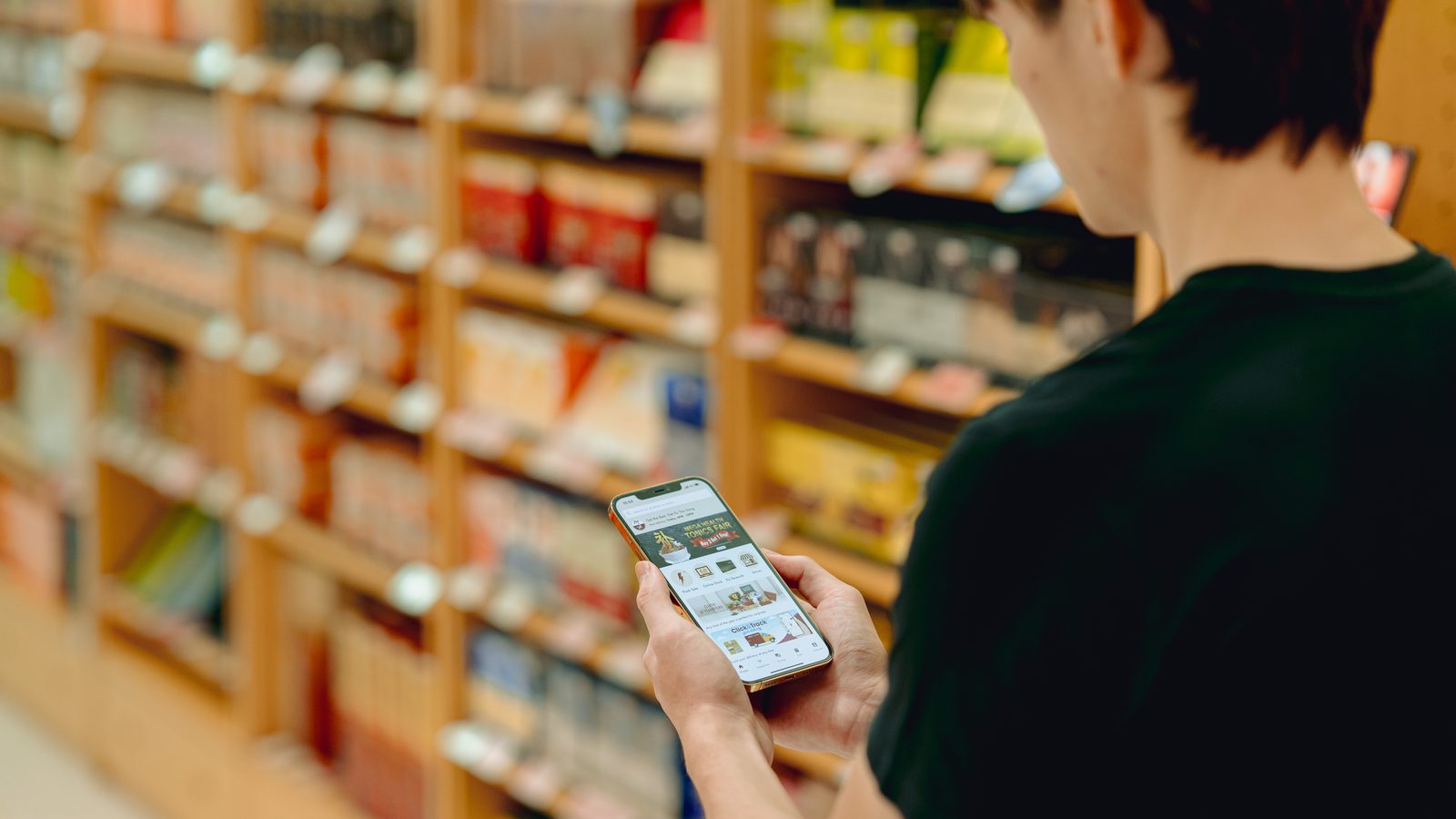 A customer using the Eu Yan Sang app in store